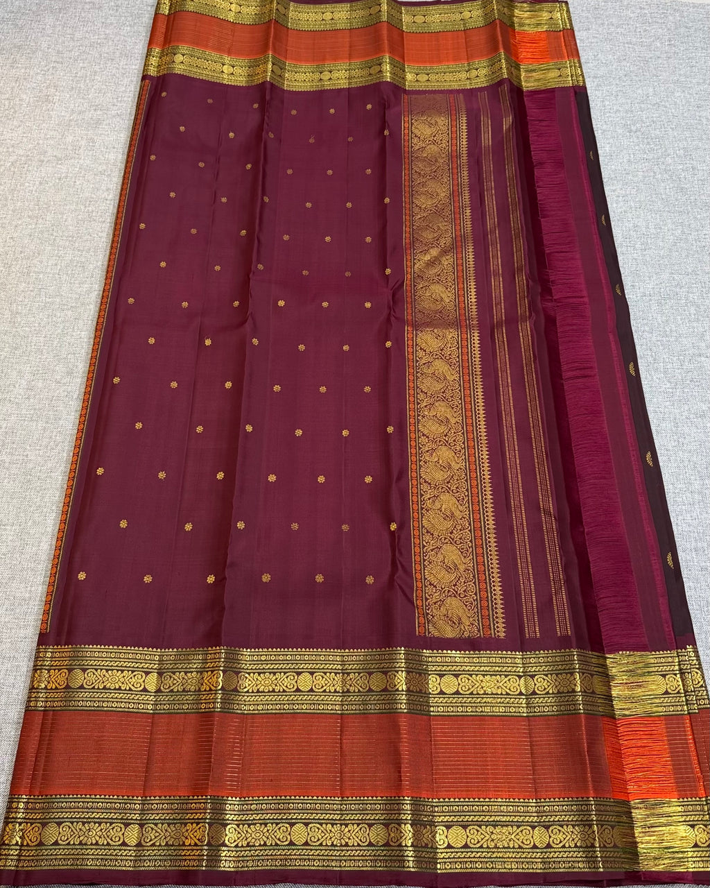 Redwine with rusty orange kanchipurams