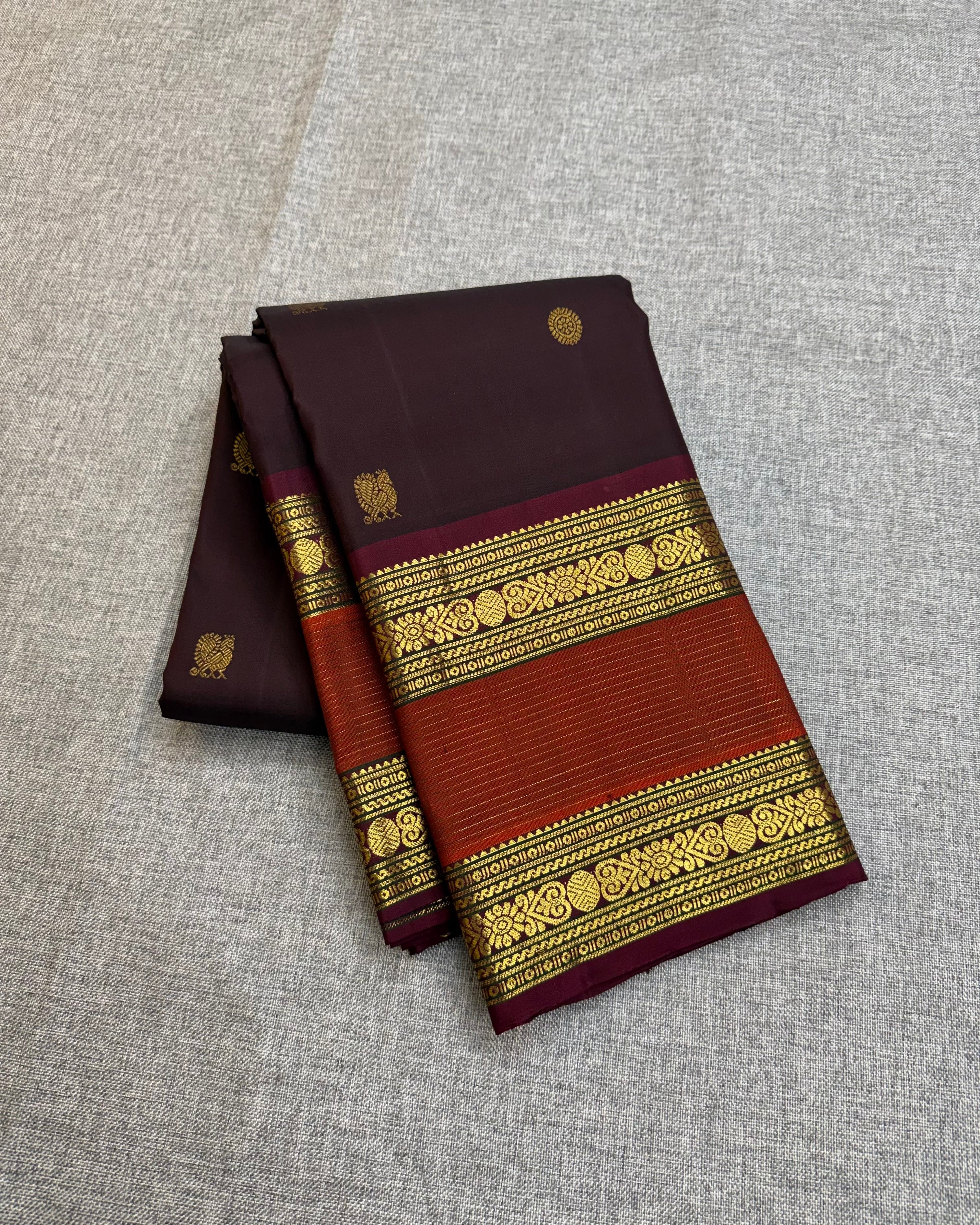 Redwine with rusty orange kanchipurams