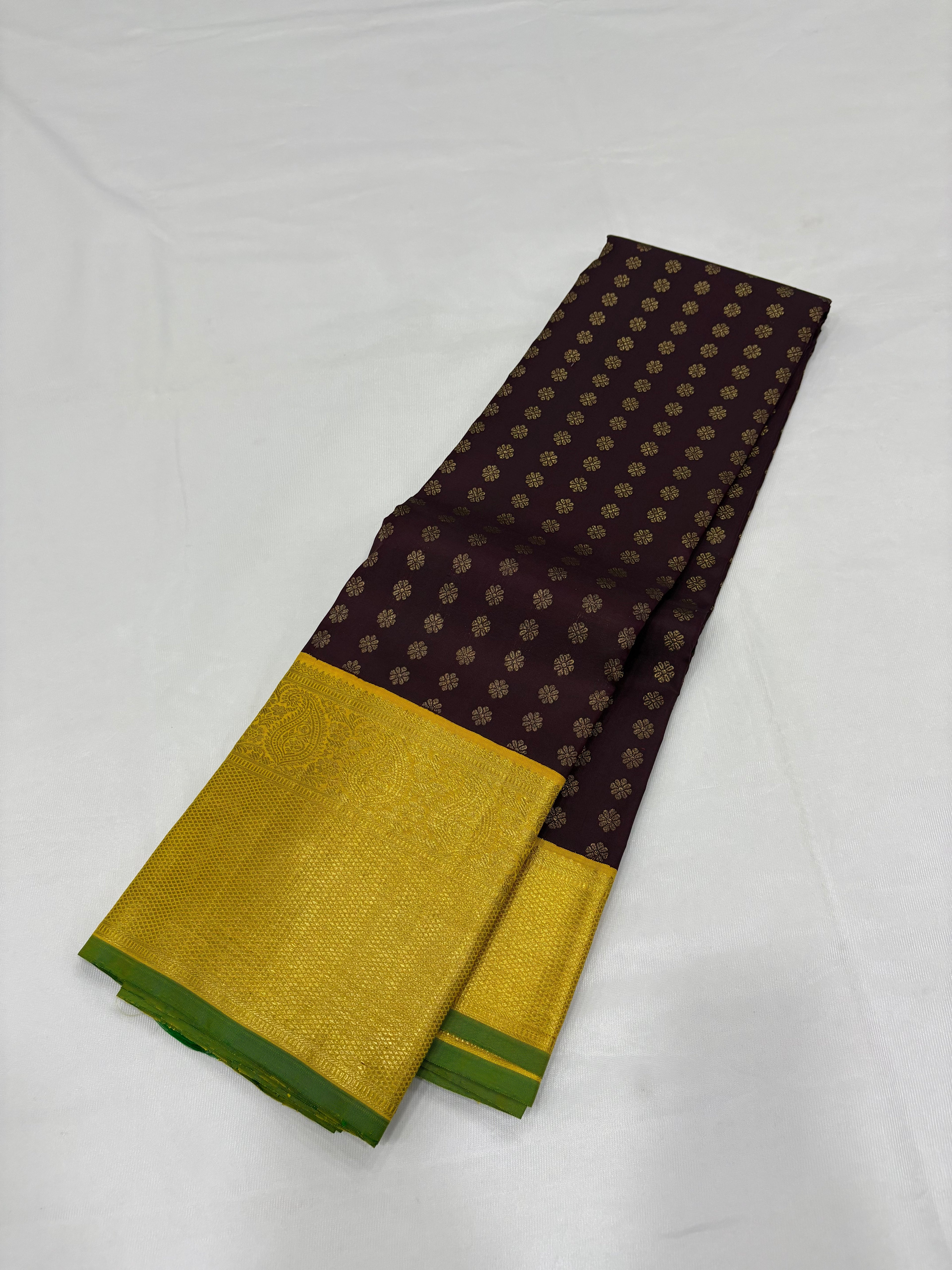 Brown with yellow kanchipuram silk saree
