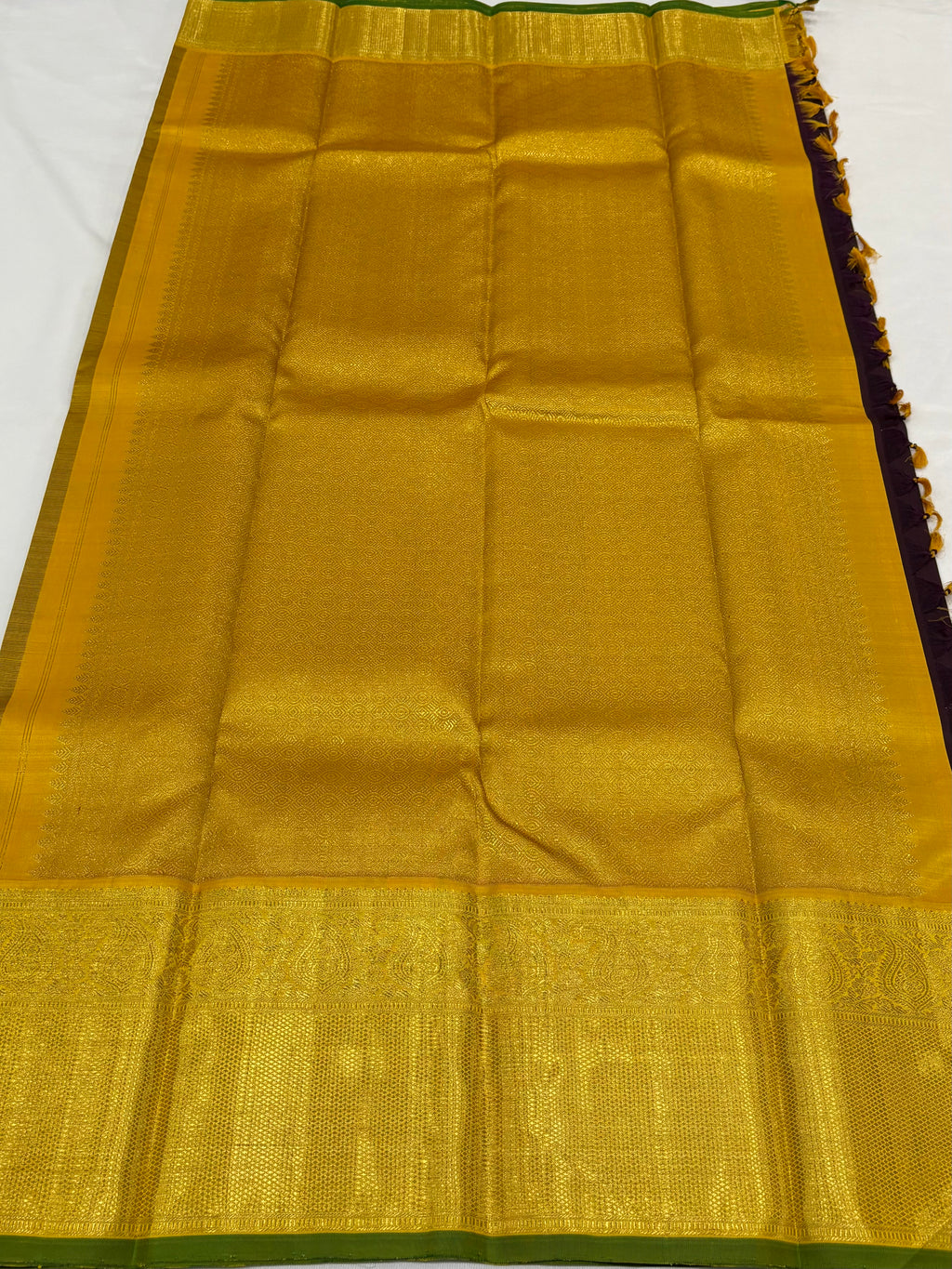 Brown with yellow kanchipuram silk saree