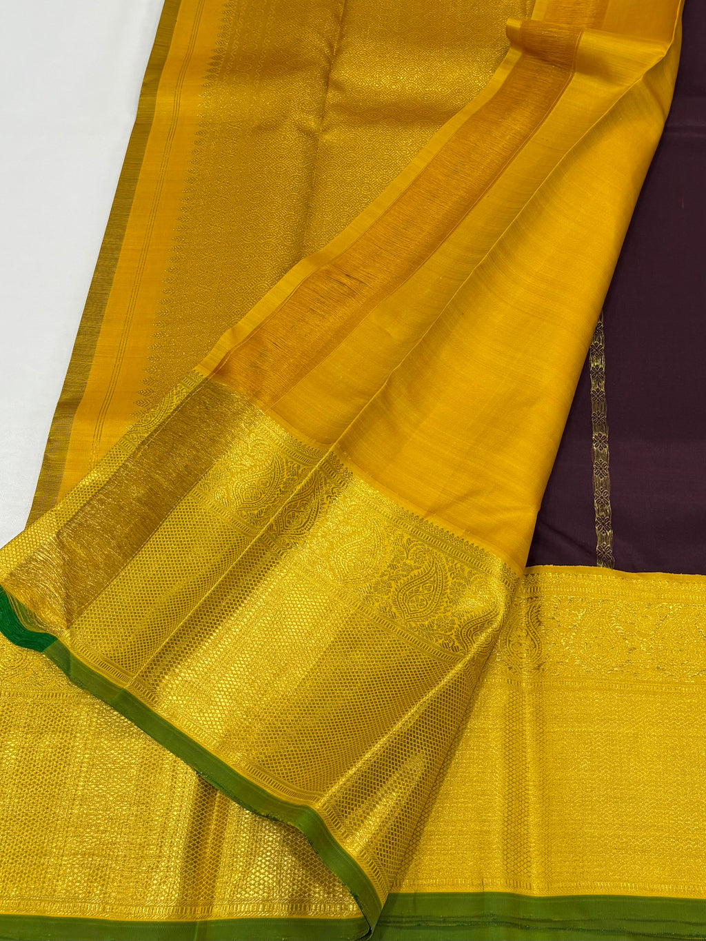 Brown with yellow kanchipuram silk saree