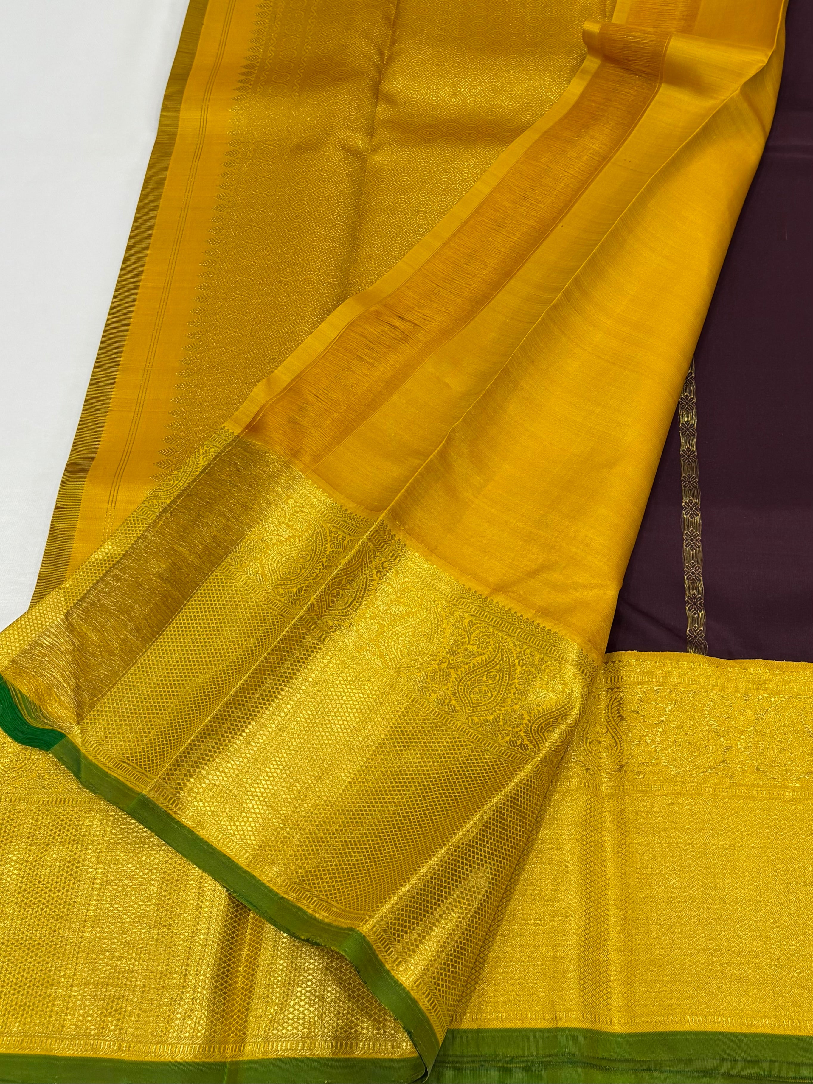 Brown with yellow kanchipuram silk saree