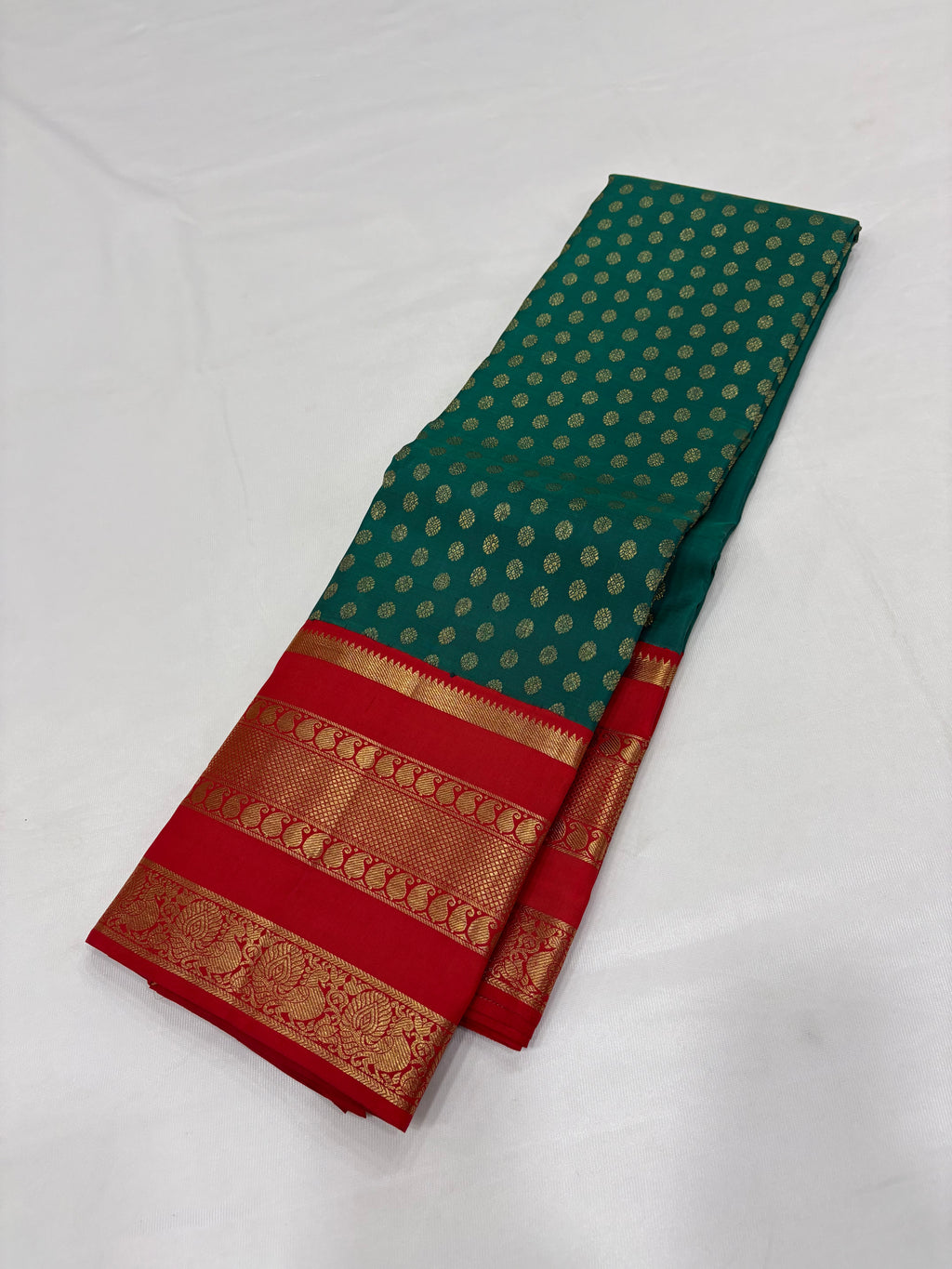 Emerald green with red kancheevarams