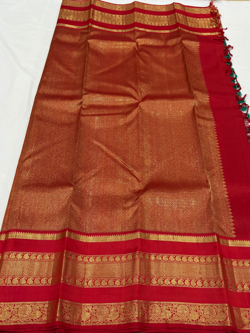 Emerald green with red kancheevarams