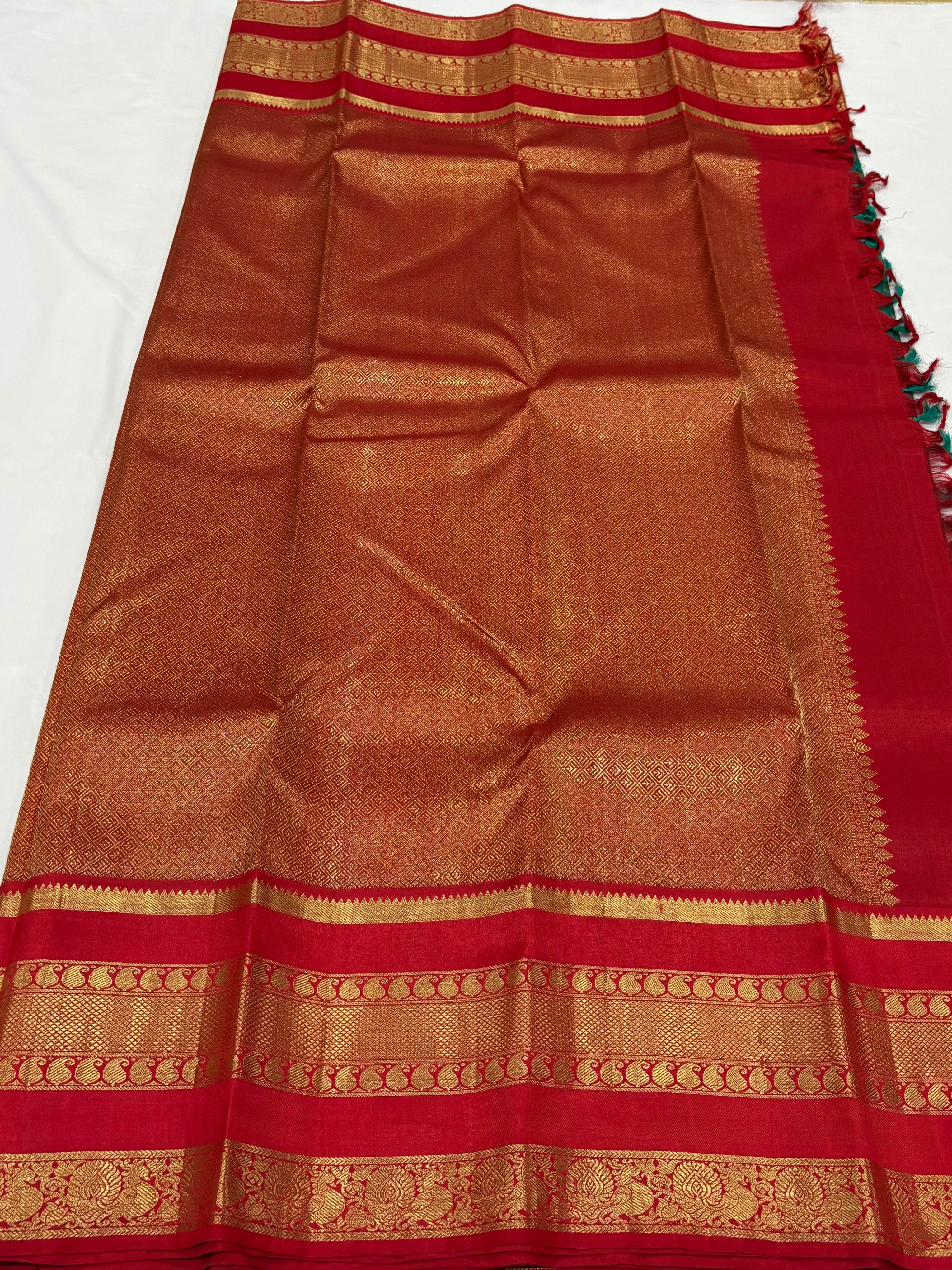 Emerald green with red kancheevarams