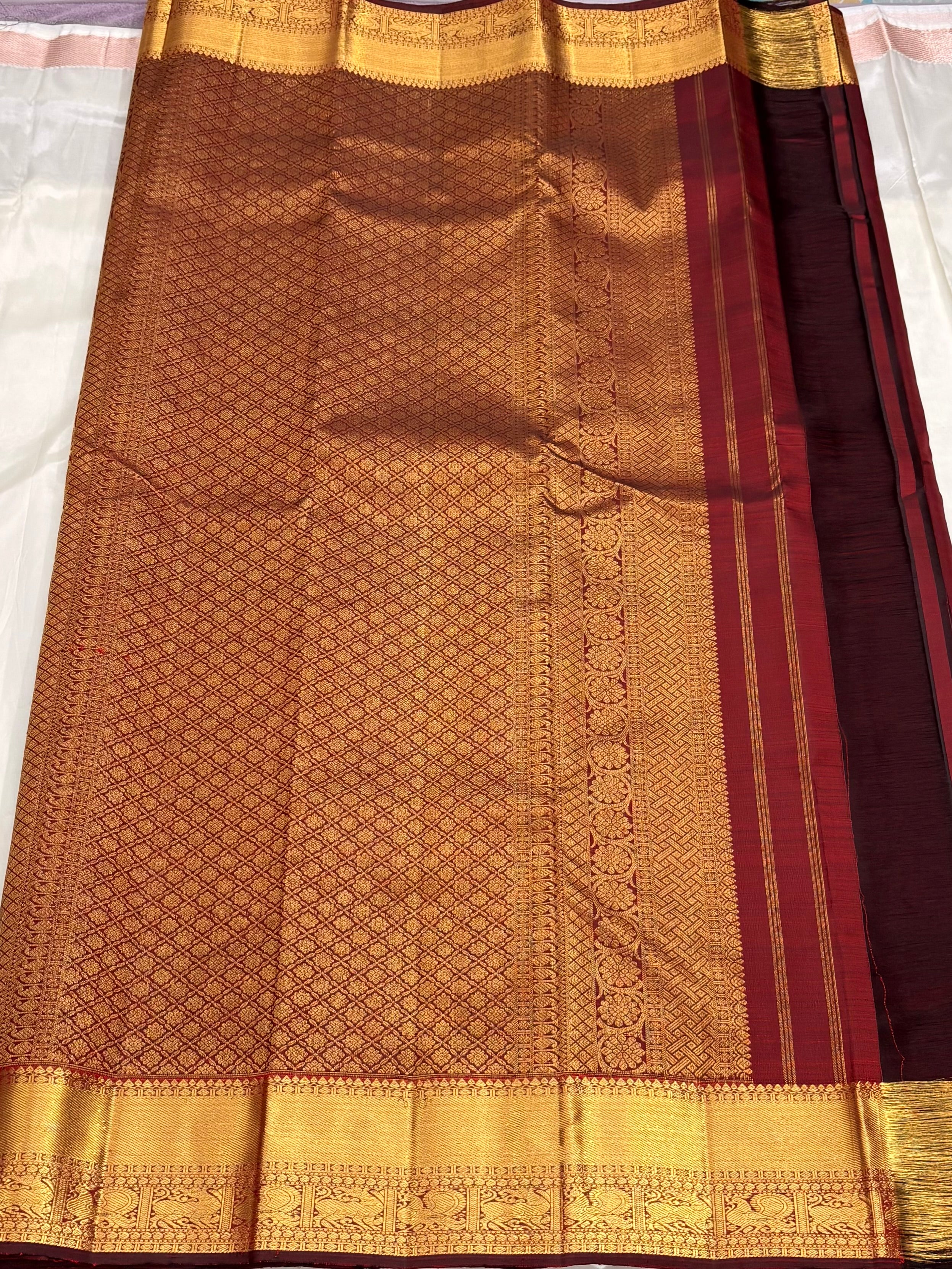 Maroon kanchipuram silk saree with veldhari weaving