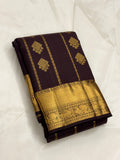 Brown Kancheevaram silk saree with vertical veldhari weaving