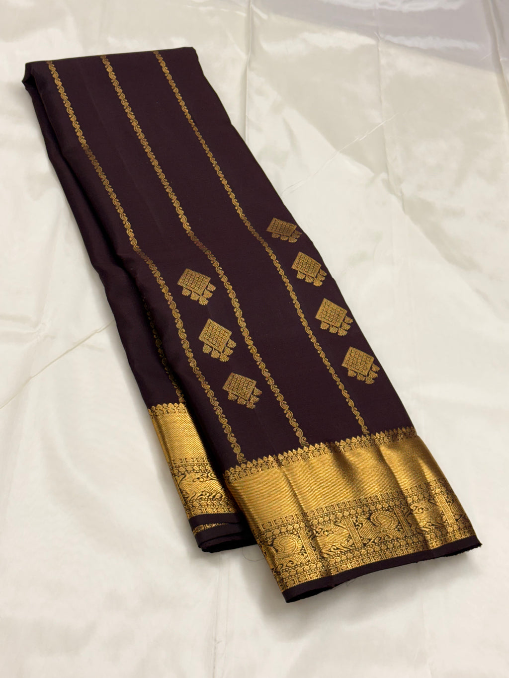 Brown Kancheevaram silk saree with vertical veldhari weaving