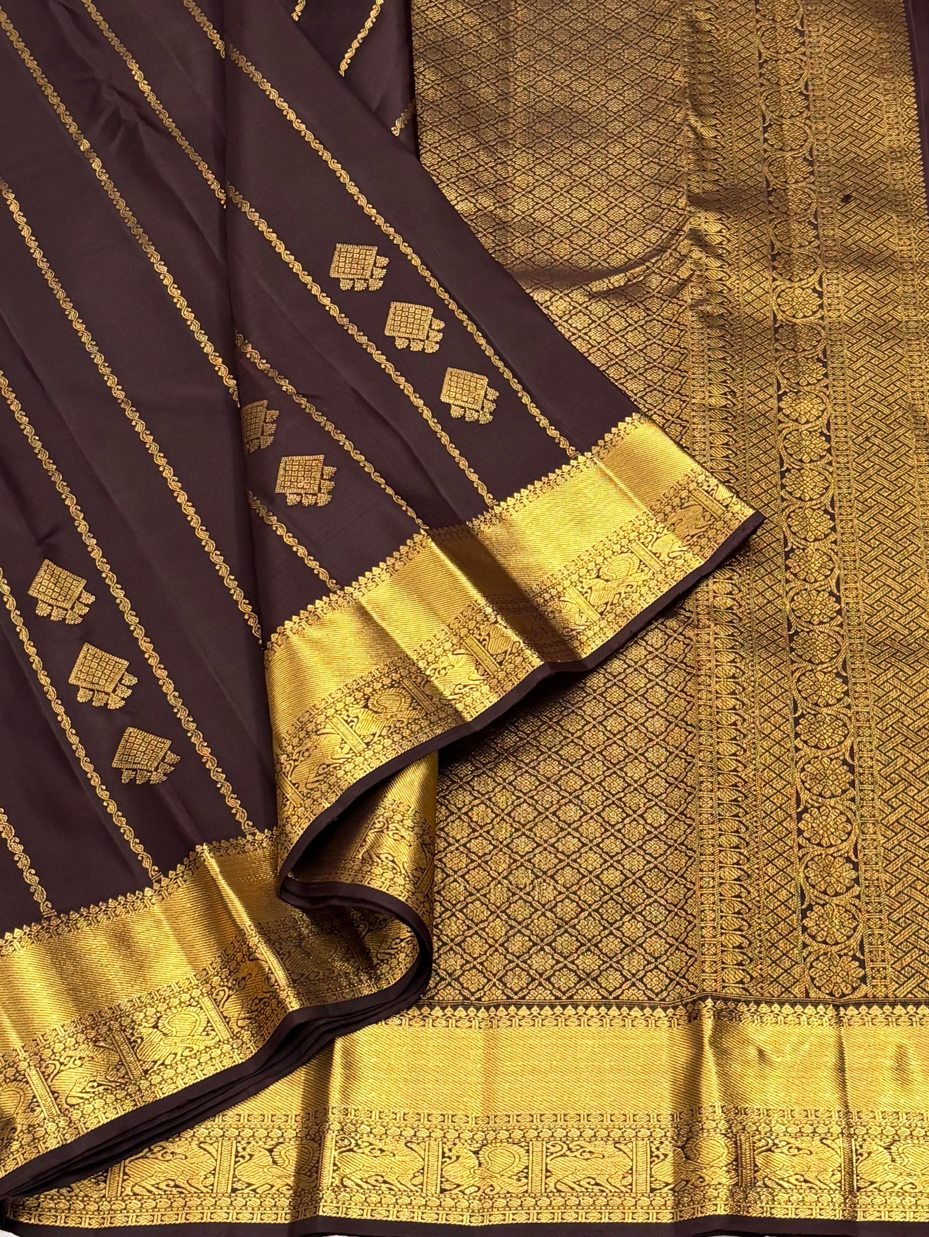Brown Kancheevaram silk saree with vertical veldhari weaving
