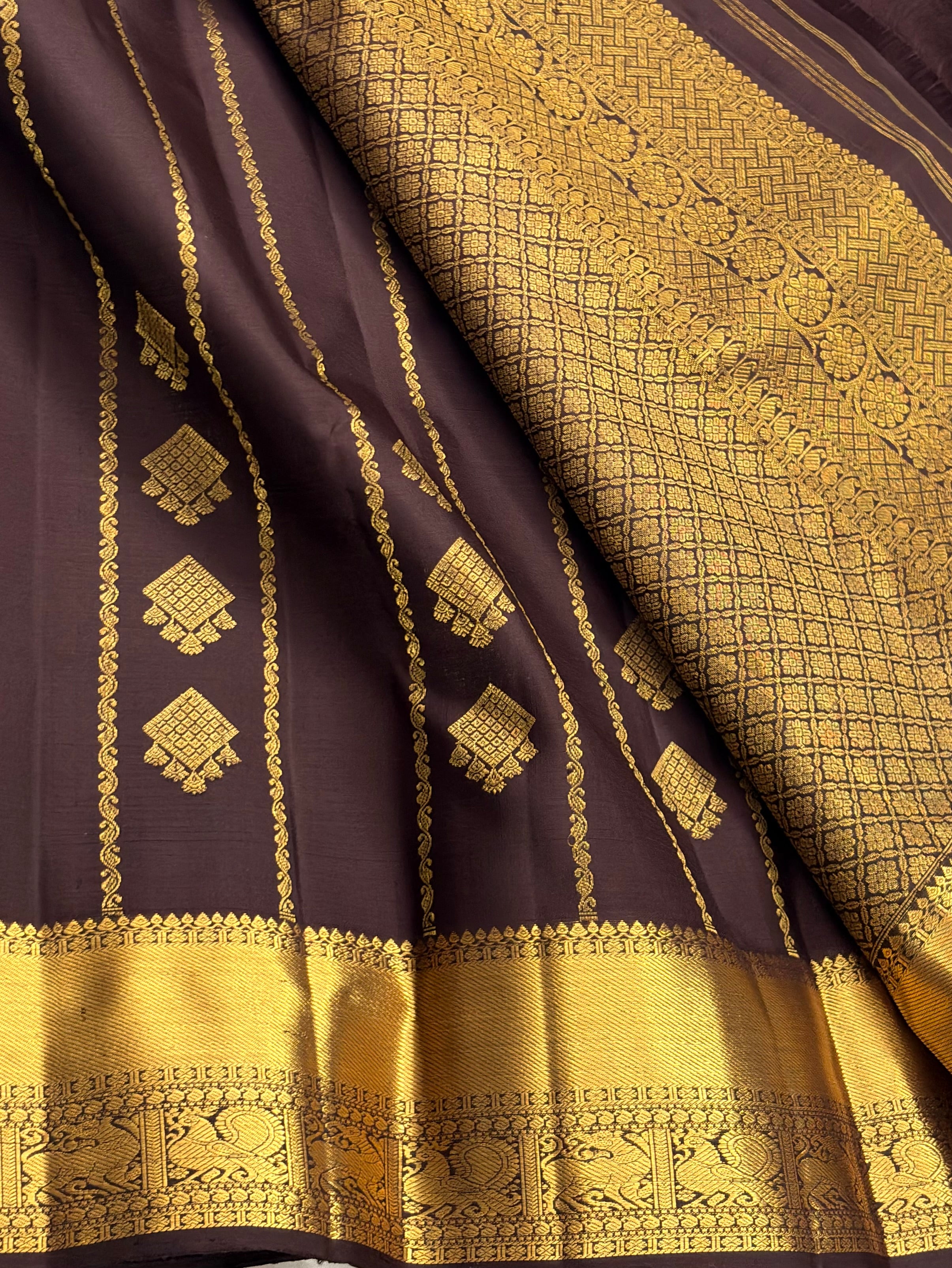Brown Kancheevaram silk saree with vertical veldhari weaving
