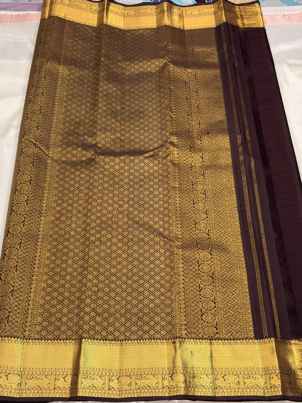 Brown Kancheevaram silk saree with vertical veldhari weaving