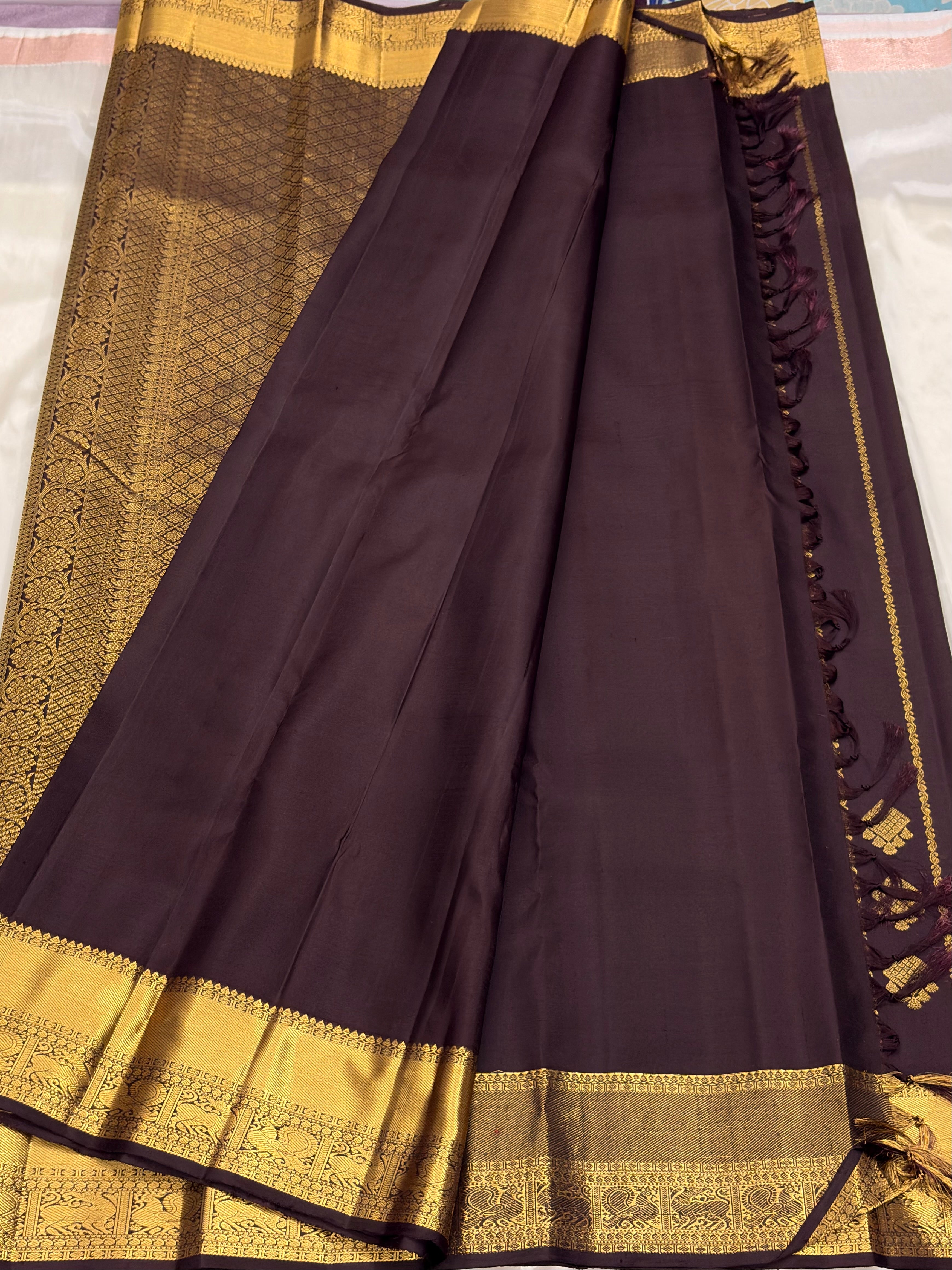 Brown Kancheevaram silk saree with vertical veldhari weaving